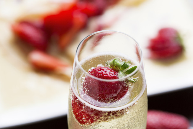 Bottle of champagne & strawberries